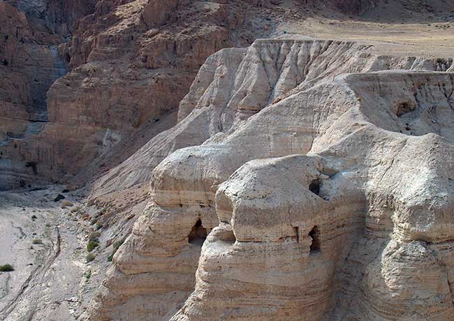 The escarpment above Qumran showing Cave 4, where the largest cache of scroll fragments was found in 1954.
